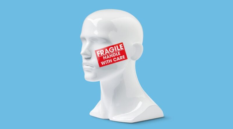 The white mannequin bust with the sticker in its stores "To deal with care of care"